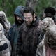 characters from walking dead hiding with zombies.